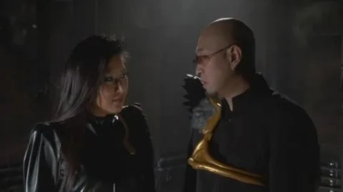 Asian Women in Leather and Superhero Costumes