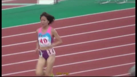 Women Running and Hurdling Outdoors