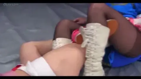 Asian Lesbians Wrestling in Ring