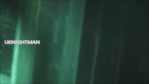 Blonde Couple Kissing at Night