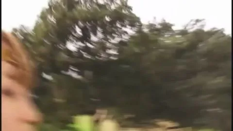 Asian Women in Costumes Engaged in Intimate Scenes Outdoors