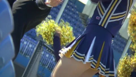 Asian Cheerleaders in Stadium