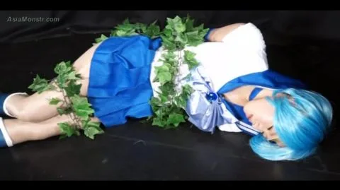 Asian Blue-Haired Performer in Erotic Scenes