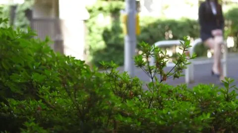 Asian woman in Superman costume dominated