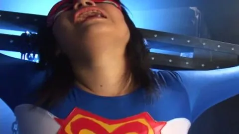 Asian in Superman Costume Industrial Fetish Scene