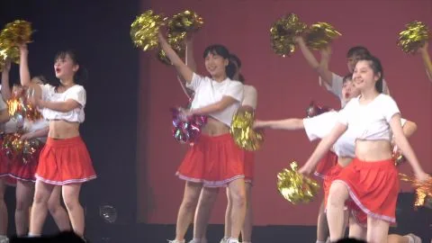 Asian Cheerleaders Dance in Uniforms