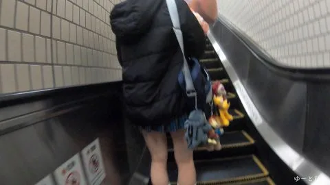 Asian Teen Girl in Blue Skirt on Public Transport