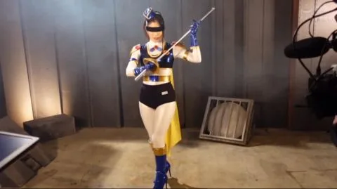 Asian Costumed Performer in Dramatic Scenes