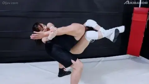 Asian Wrestlers in Swimsuits Wrestling Match