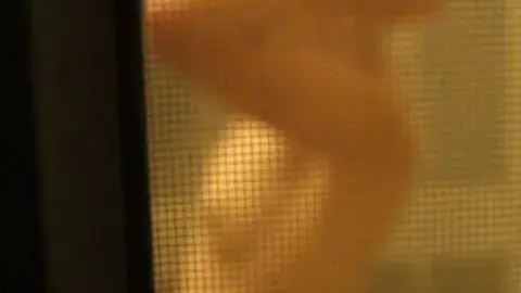 Caucasian Man Showering and Drying Off