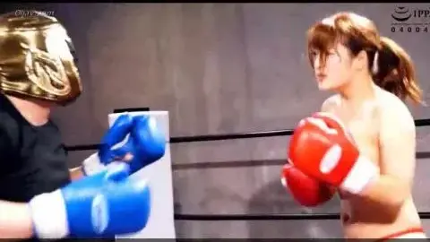 Asian Woman Boxer Punched by Man