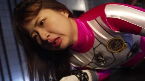 Asian Women in Futuristic Costumes Engage in Intimate Encounter