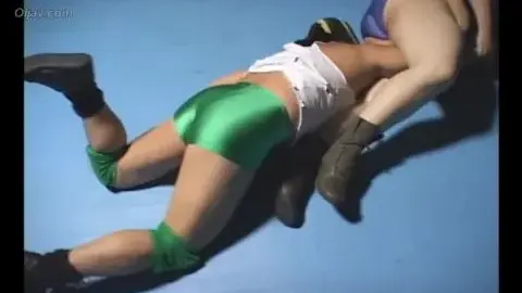 Asian Women Wrestling with Muscular Man
