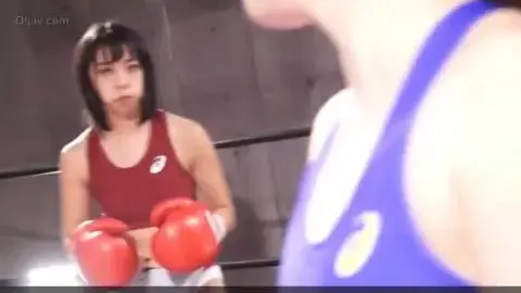 Asian Girls Boxing Match in Gym