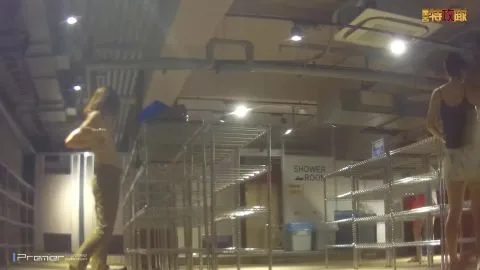 Asian Girls Interacting in Warehouse