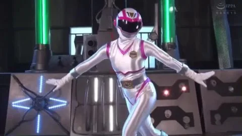 Asian Duo in Silver Costumes Engage in Erotic Scene