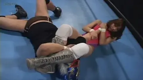 Wrestling Match Between Two Women in Bikinis