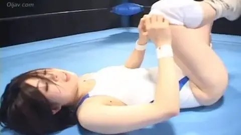 Asian Lesbians Wrestling in Leotards