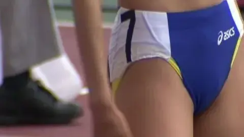 Asian Athletic Beauty in Track Stadium
