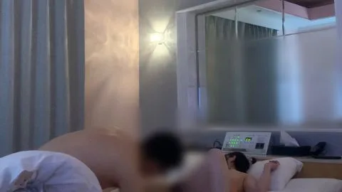 Naked Couple Engaging in Intimate Act