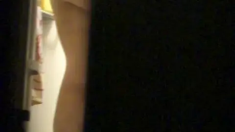 Asian Girl Drying Off in Bathroom