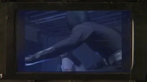 Monster Costume Scene with Asian Female and Muscular Male