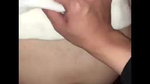 Asian Girl Performs Oral Sex on Man in Bedroom