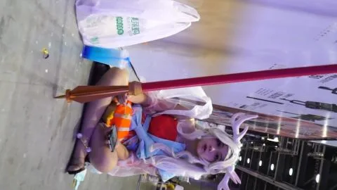 Blonde Asian Cosplayers in Erotic Convention Moments