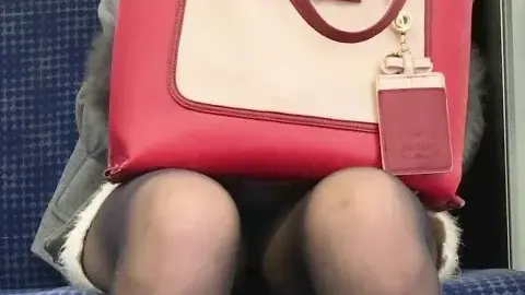 Asian girl in short skirt on public transportation