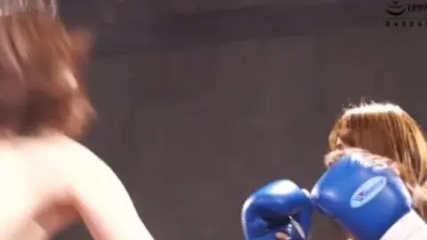 Asian Women Boxing Topless in Ring