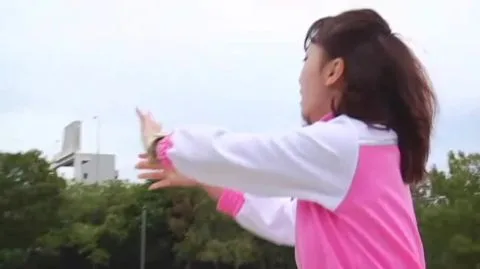 Asian Girl Fights with Muscular Man Outdoors