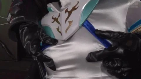 Asian Girl in Futuristic Costume Restrained and Touched