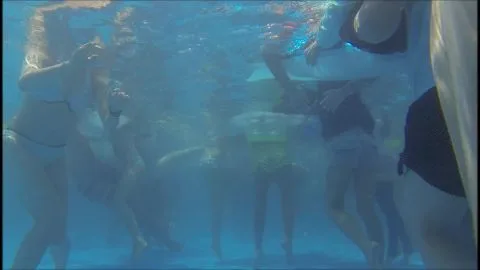 Girls Swimming and Playing Underwater