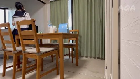 Woman in Underwear Bent Over Furniture