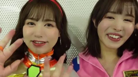 Asian Cosplay Duo in Superhero Costumes