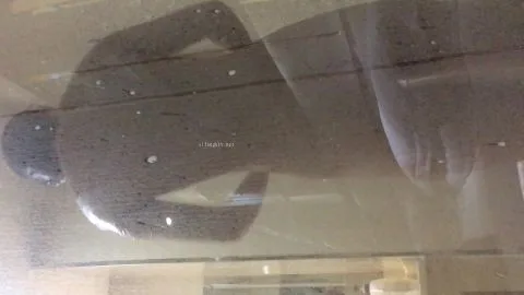 Blonde Bombshell in Steamy Shower Solo