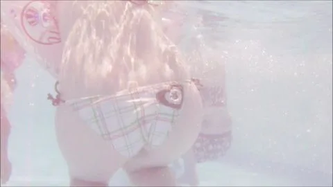 Blonde Babes Play in Pool