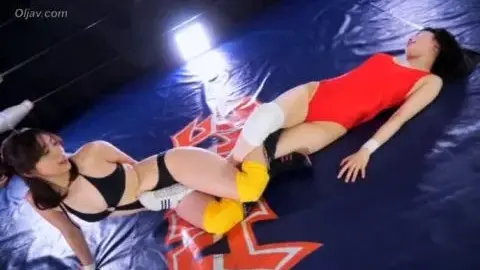 Asian Lesbians Wrestling in Sports Attire