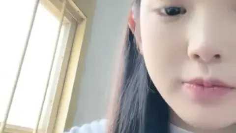 Asian Teen with Smooth Skin and Long Dark Hair