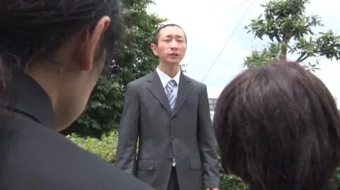 Asian Performers in Masks and Costumes