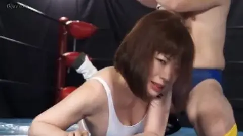 Asian Couple Wrestling in Ring