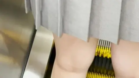 Asian Teen in Gray Skirt and Knee-High Socks