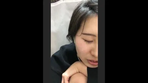 Asian woman gives a sensual handjob