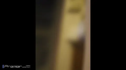 Asian girl getting ready in bathroom