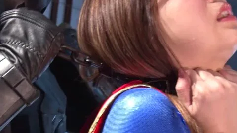 Bound and Subdued Woman in Red Boots