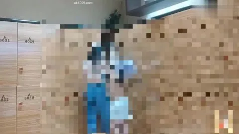 Asian Girl Changing Clothes in Locker Room