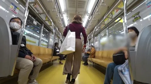 Asian Brunette in Mask Subway Encounter