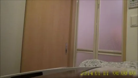 Asian Woman with Navel Piercing in Bedroom