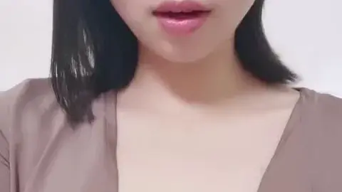 Asian Teen with Tongue Piercing in Intimate Bedroom Moments