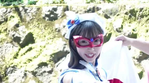 Asian Girl in Red Glasses and White Outfit